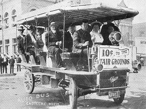 Early 1900s autobus on Mitchell Street, Cadillac MI
